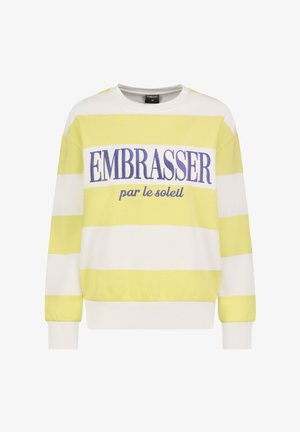 White and yellow striped sweatshirt with "EMBRASSER par le soleil" text in purple. Features long sleeves and ribbed cuffs and hem.