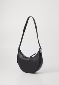 Black leather shoulder bag with a curved shape, zip closure, and a flat front pocket. Features silver hardware and an adjustable strap.