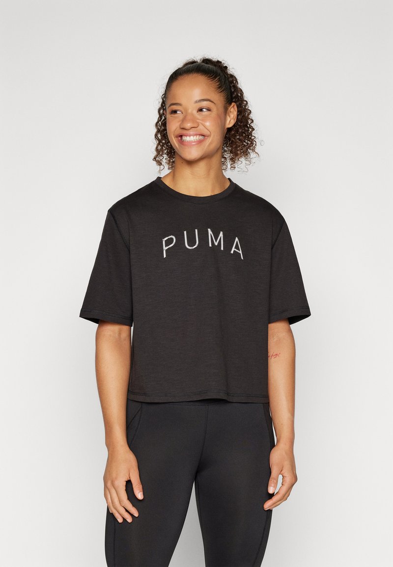 Puma WOMEN’S GRAPHIC BOXY CROP MOVE TEE - Sportfelső - black/fekete ...
