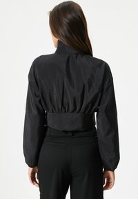 Koton ZIPPER DETAIL CROP - Lichte jas - black