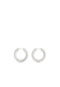 Silver hoop earrings with a textured pattern along the edge, featuring a circular shape and a secure clasp design.