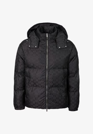 Zwarte donzen jas met een geometrisch patroon op het oppervlak, een voorrits en een afneembare capuchon. Voorzien van elastische manchetten en drukknopen.