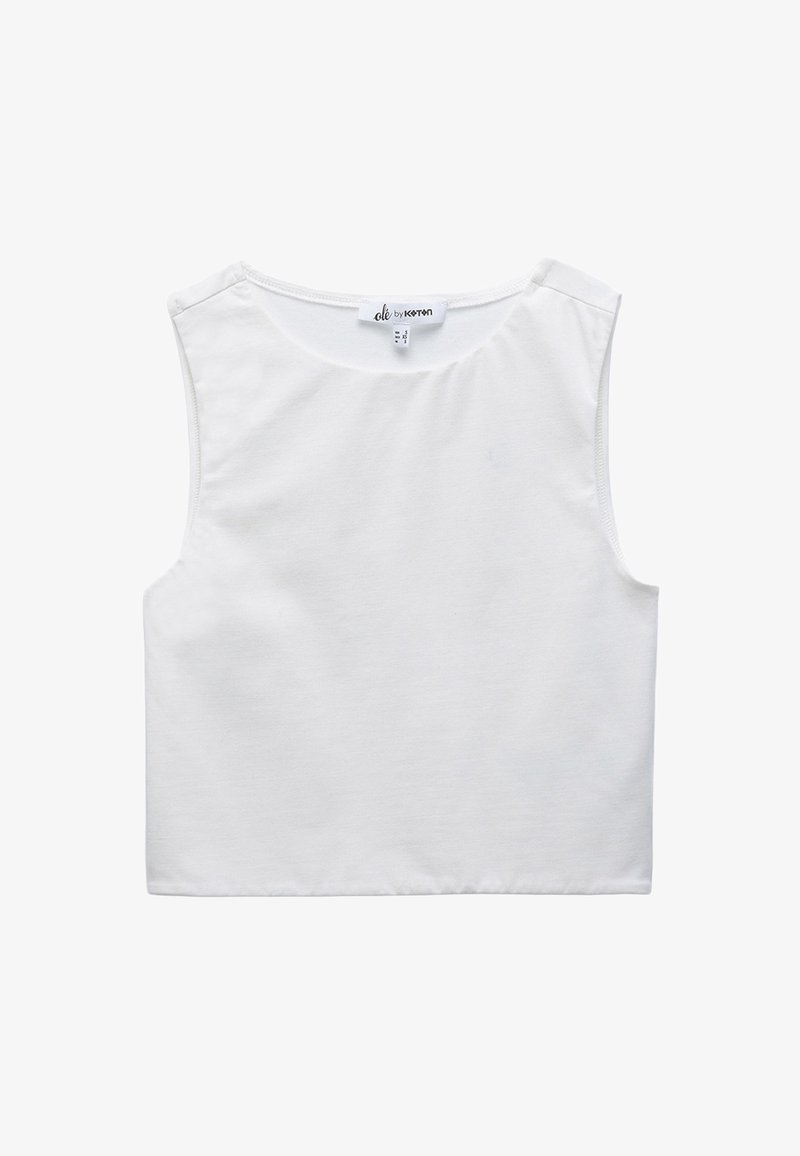 Weißes ärmelloses Cropped-Top mit rundem Halsausschnitt und sichtbarem Markenetikett am Nacken.