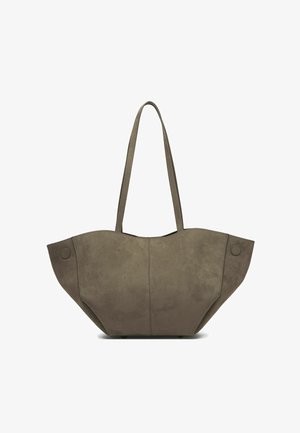 Geantă tote din suede verde oliv, cu două mânere lungi, formă rotundă, cusături vizibile și accente circulare din metal pe părți.