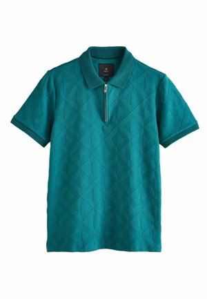 Teal kortærmet polo med lynlås ved halsen og geometrisk teksturmønster. Har klassisk krave og ribbede manchetter.