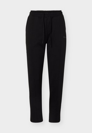 Champion, SPORTSWEAR OPEN HEM PANTS STANDARD FIT - Tracksuit bottoms - black