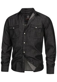 Schwarzes Denim-Hemd mit langen Ärmeln, zwei Brusttaschen, knöpfbarem Frontverschluss und silbernen Knopfakzenten. Weiches Material mit einer leicht strukturierten Oberfläche.