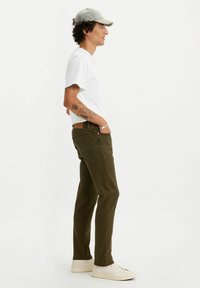 Levi's® Vaqueros tapered - moto cross adv