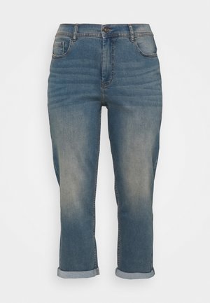 Blå falmede denimjeans med knap og lynlås foran, forlommer og opbukket kant.