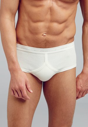 White ribbed men's briefs with a contoured pouch, elastic waistband featuring a subtle logo, and smooth texture.