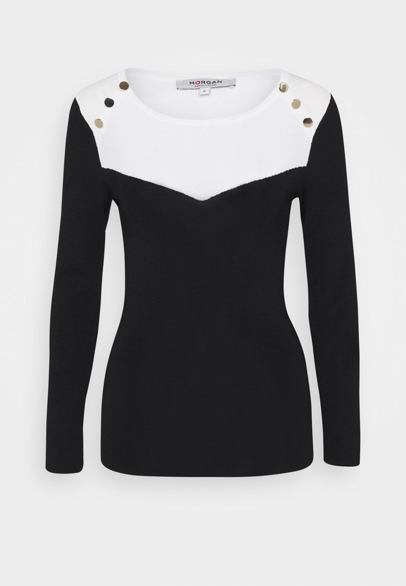 Haut manches longues noir et blanc avec empiècement blanc et boutons dorés et noirs aux épaules, cintré avec encolure arrondie.