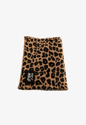 Tissu en imprimé léopard beige et noir avec des accents verts. Présente une étiquette "KEEP IT WILD" en blanc sur un fond noir. Texture douce.