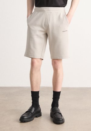 MICRO LOGO REPREVE - Tracksuit bottoms - dove