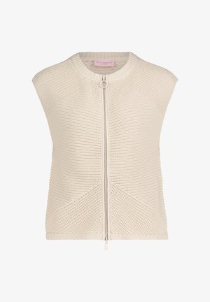 Lichtbeige gebreid vest met een ronde hals, korte mouwen en een ritssluiting aan de voorkant. Heeft een gestructureerde stof en diagonale naaddetails.