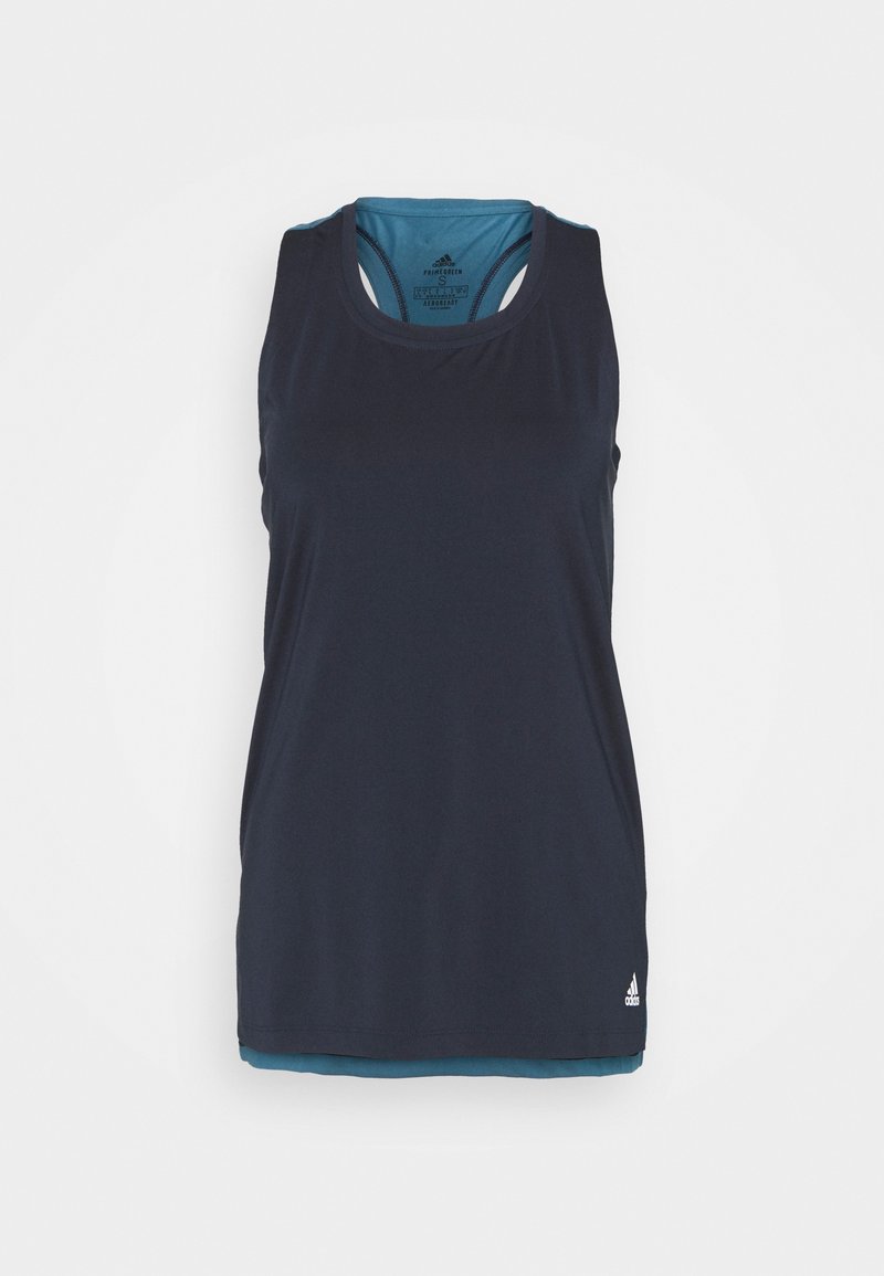 Canottiera sportiva blu navy con scollatura rotonda e spalline sottili, con un sottofondo turchese a contrasto e un piccolo logo sull'orlo.