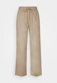 Ljust beige vida byxor med elastisk midja och snörning. Slät textur, rak modell, och inga synliga fickor eller mönster.