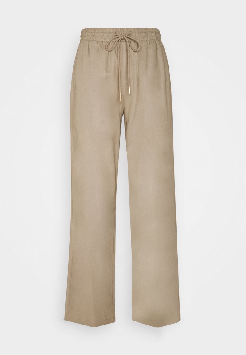 Ljust beige vida byxor med elastisk midja och snörning. Slät textur, rak modell, och inga synliga fickor eller mönster.