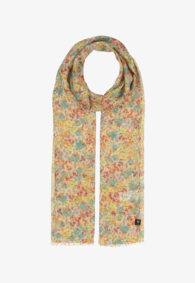 Écharpe rectangulaire légère avec un motif floral multicolore aux teintes jaune, rouge, vert et bleu, avec bords effilochés et une petite étiquette de logo noire.