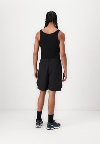 The North Face CARGO POCKET - Shorts - black