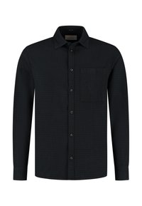 Zwart shirt met lange mouwen van gestructureerde stof, voorzien van een knoopsluiting aan de voorkant, een borstzak en een kraag.