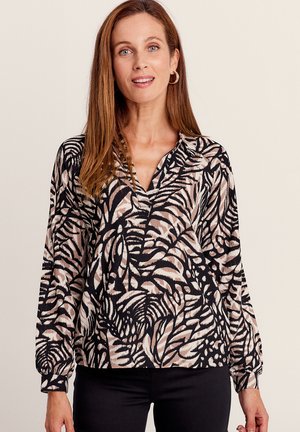 Zwarte en crèmekleurige blouse met een bloemenpatroon, lange mouwen en een kraag. Textiel met een ontspannen pasvorm.