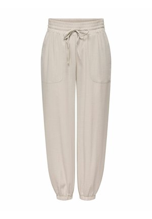 Világos bézs színű jogging nadrág rugalmas derékpánttal, húzózsinórral, oldalzsebekkel és elasztikus szegélyekkel, fehér háttéren.