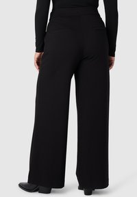 Les Lunes Pantaloni - schwarz