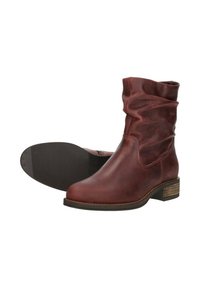 Red leather ankle boots with a slouchy design, rounded toe, and a low stacked heel. The sole features a textured black rubber for grip.
