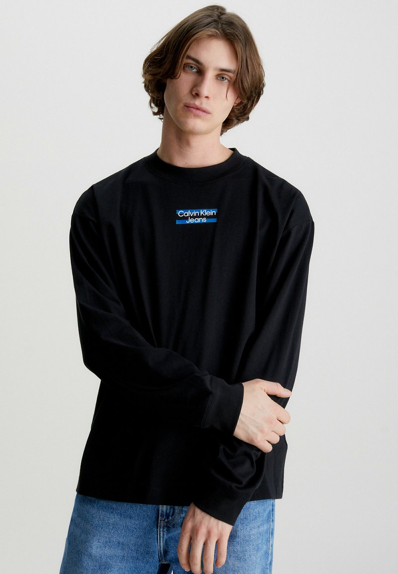 Calvin Klein Jeans TRANSPARENT STRIPE LOGO LS - Hosszú ujjú felső - ck black