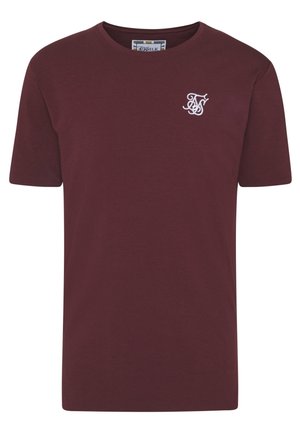 Bordové tričko s krátkým rukávem vyrobené z bavlny. Na levém prsu má bílé vyšívané logo. Standardní kulatý výstřih a rovný střih.