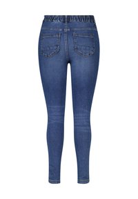 Leggings en denim bleu foncé avec une taille élastique. Deux poches arrière avec des détails de couture limités. Design de jambe fuselée.