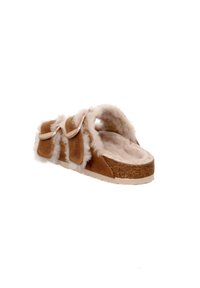 Brown fur-lined slipper with two adjustable straps, cork sole, soft lining, and open-toe design. Textured exterior with plush accents.