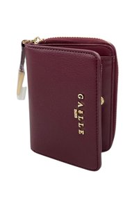 Portafoglio compatto in pelle bordeaux con zip dorata e logo in oro "GAËLLE PARIS" impresso sulla parte anteriore.