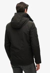 Superdry & Co ULTIMATE SD CHEATER - Übergangsjacke - jet black black