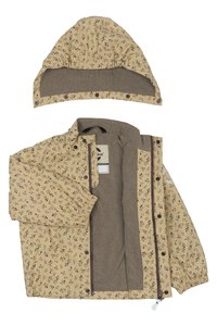 Giacca beige con motivi a foglia verde, dotata di chiusura con zip, polsini elastici e un rivestimento interno marrone morbido e testurizzato; include un cappuccio abbinato.