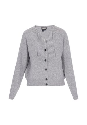 Harmaa neuletakki, joka on valmistettu pehmeästä neulemateriaaleista. Takissa on ribbineuleinen kaulus, napitus etupuolella ja pitkät hihat, joissa on rento leikkaus.