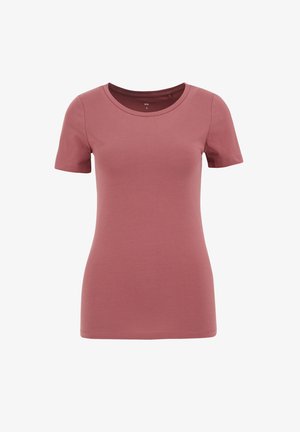 Īsām piedurknēm T-krekls putekļu rozā krāsā, ar apaļu kakla izgriezumu, pieguļoša forma, mīksts džersija audums un bezšuvju apmale, lai nodrošinātu tīru izskatu.