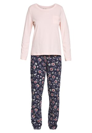 Cotton pajama set with a light pink long-sleeve top featuring a chest pocket, paired with navy floral-print pants.