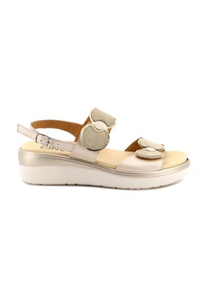 Sandali con zeppa - beige