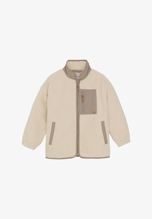 Veste en polaire crème avec des accents beiges, dotée d'une fermeture éclair sur le devant, d'un col haut, de poignets élastiques et d'une poche poitrine avec fermeture éclair.