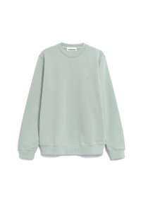 Vaaleanvihreä collegepaita pehmeästä kankaasta, jossa on pyöreä pääntie, pitkät hihat, resorit hihansuissa ja pieni kirjailtu logo rinnassa.