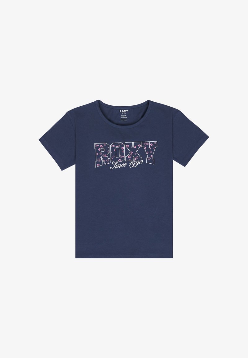 T-shirt bleu marine avec le mot "ROXY" en lettres audacieuses, avec un motif floral et "Depuis 1990" en cursive en dessous.