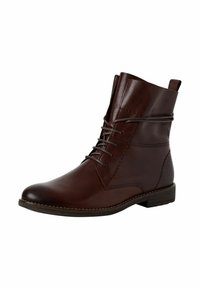 Bottines en cuir marron avec un bout rond, un talon plat et un laçage à l'avant ; elles présentent des détails de couture et une languette.