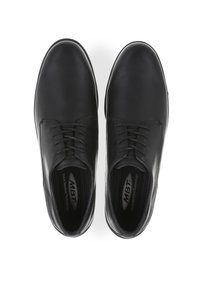 Scarpe in pelle nera con un design elegante, dotate di chiusura con lacci e una soletta testurizzata. Le suole hanno una forma arrotondata per il massimo comfort.