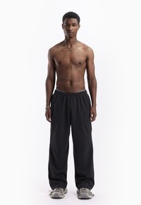 FAVELA DART JOGGER UNISEX - Tracksuit bottoms - black