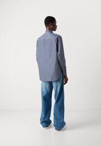 Lacoste UNISEX - Button-down blouse - navy blue/flour/delphinium/france blue
