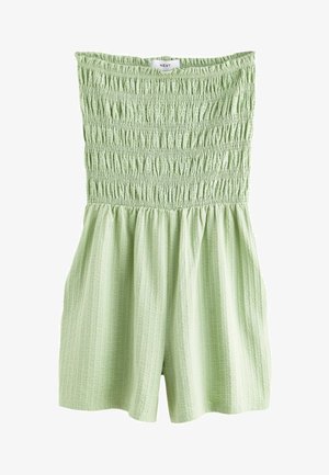Zielony kombinezon na ramiączkach z marszczeniami, wykonany z teksturowanej tkaniny. Posiada elastyczny dekolt i talię ze ściągaczem. Krótkie nogawki, lekkie wykonanie.