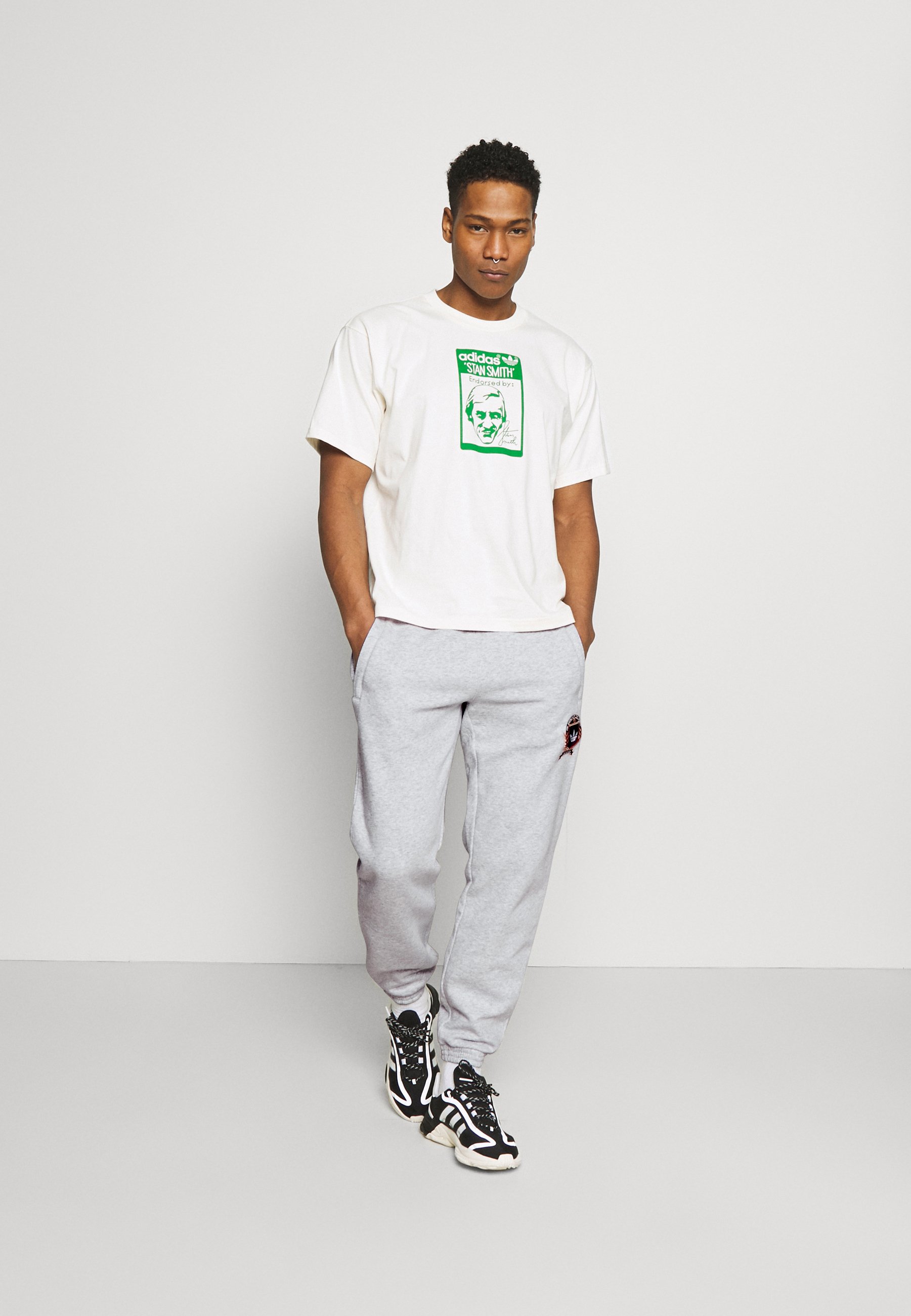 light grey adidas tracksuit