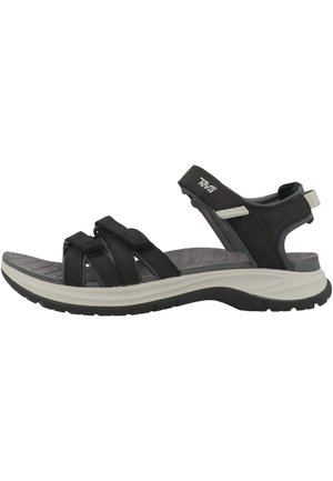 Černošedý sportovní sandál Teva s otevřenou špičkou, nastavitelnými suchými zipy a polstrovanou podrážkou, zobrazený z bočního profilu.