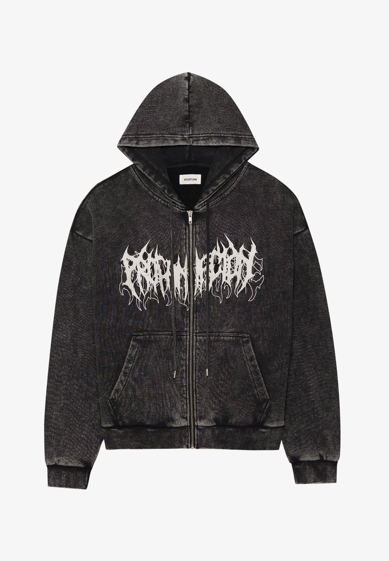 Czarna bluza z kapturem na zamek błyskawiczny, wykonana z fakturowanej tkaniny, z kieszeniami z przodu i białym nadrukiem graficznym na klatce piersiowej.